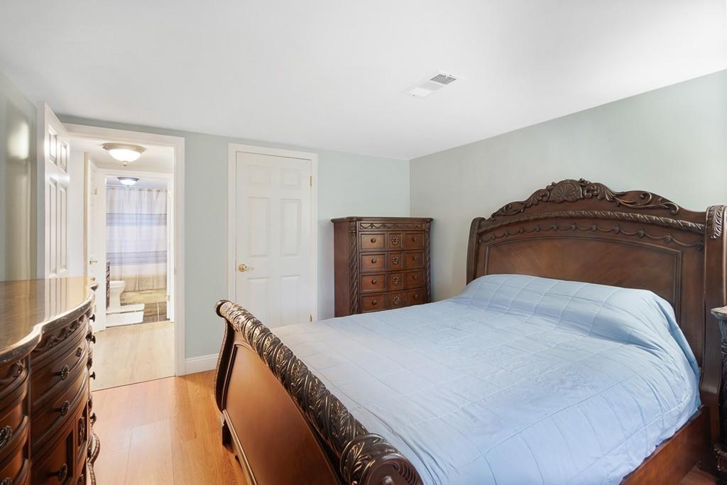 68 Lowell Road Pepperell, MA 01463 - Photo 16 of 24 a bedroom with a bed and a dresser