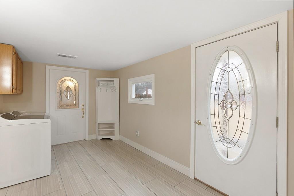 68 Lowell Road Pepperell, MA 01463 - Photo 4 of 24 a view of empty room with window and mirror