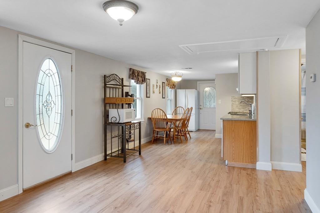 68 Lowell Road Pepperell, MA 01463 - Photo 7 of 24 a view of a livingroom with furniture and a window