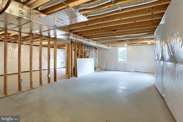 a view of a house with a yard and the roof