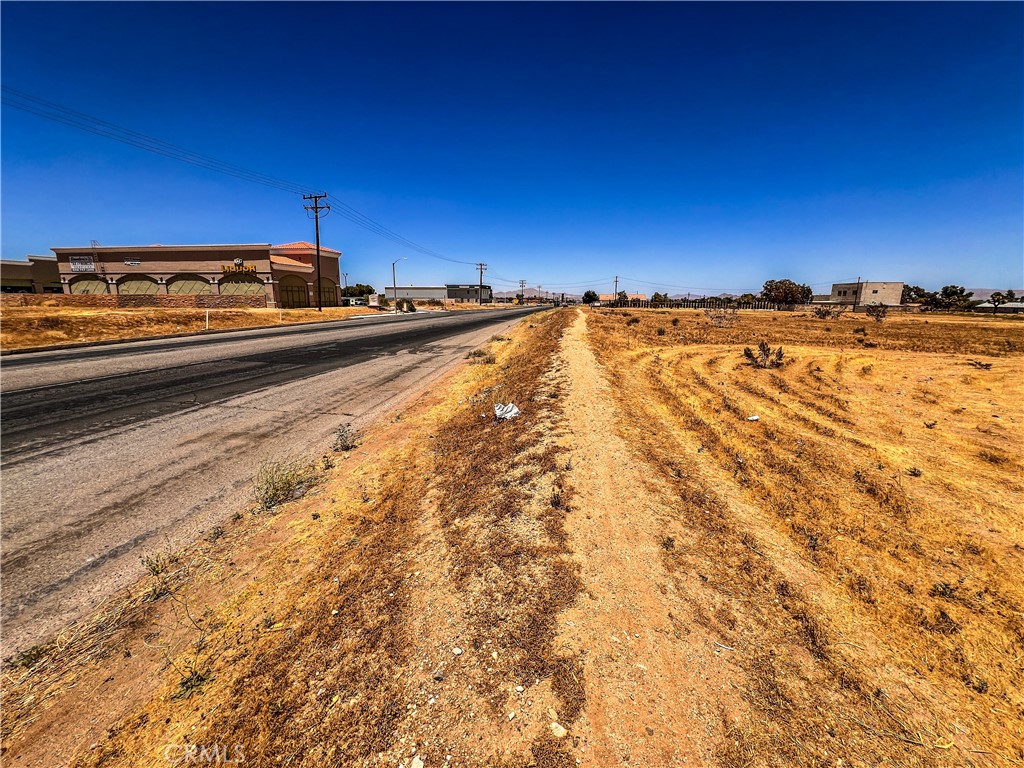 11125 Hesperia Road Hesperia, CA 92345 - Photo 2 of 6 a view of a water with a building in the background