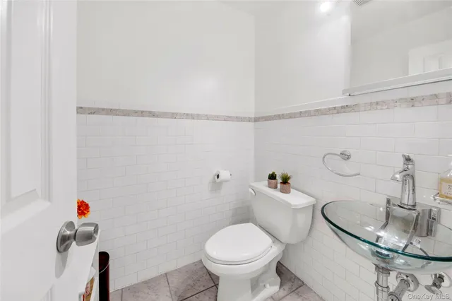 a bathroom with a sink and toilet