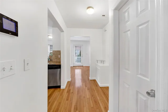 a view of a livingroom with wooden floor