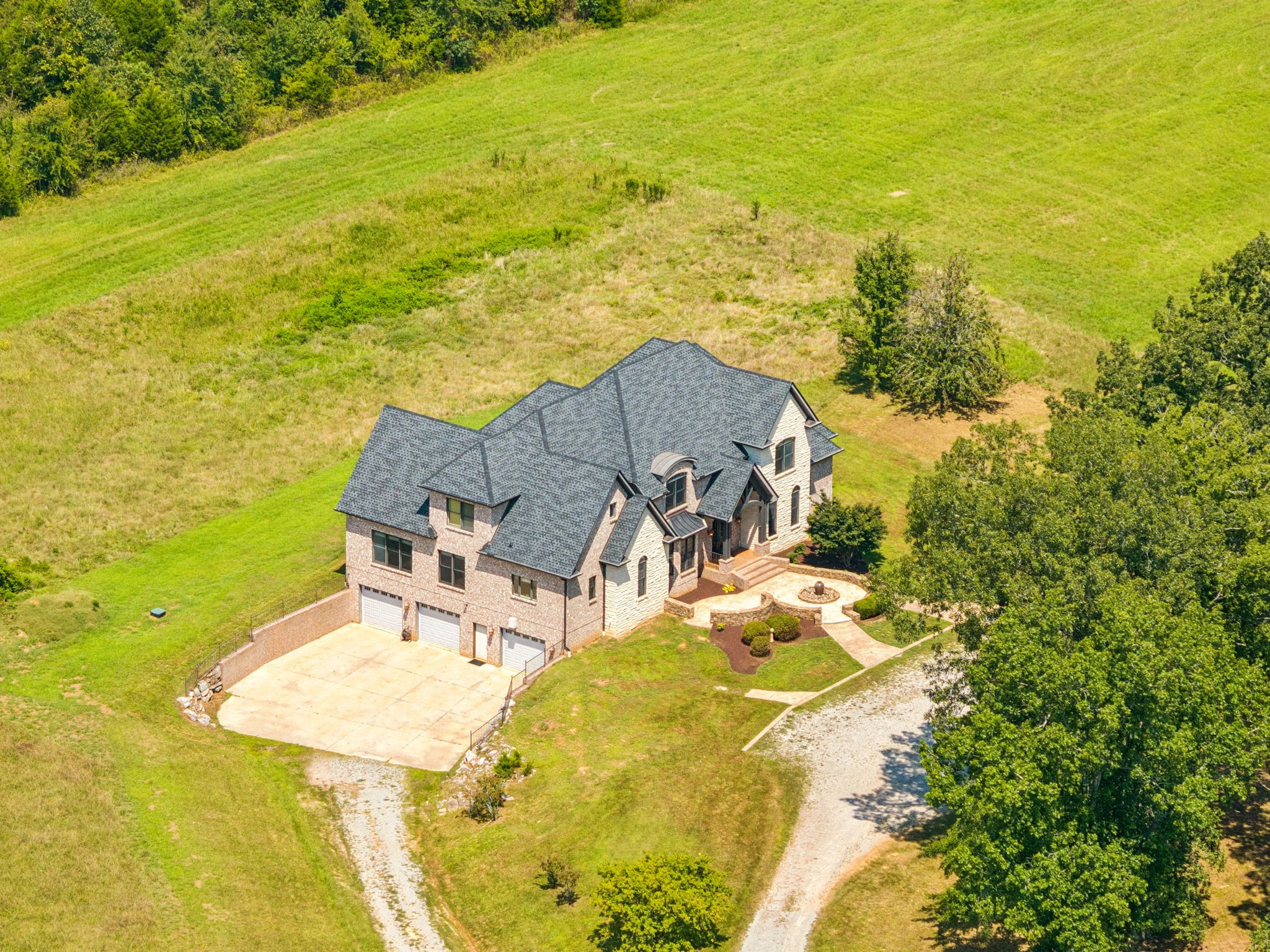 2089 Joe Brown Road Spring Hill, TN 37174 - Photo 54 of 59 a view of a swimming pool with a table and chairs