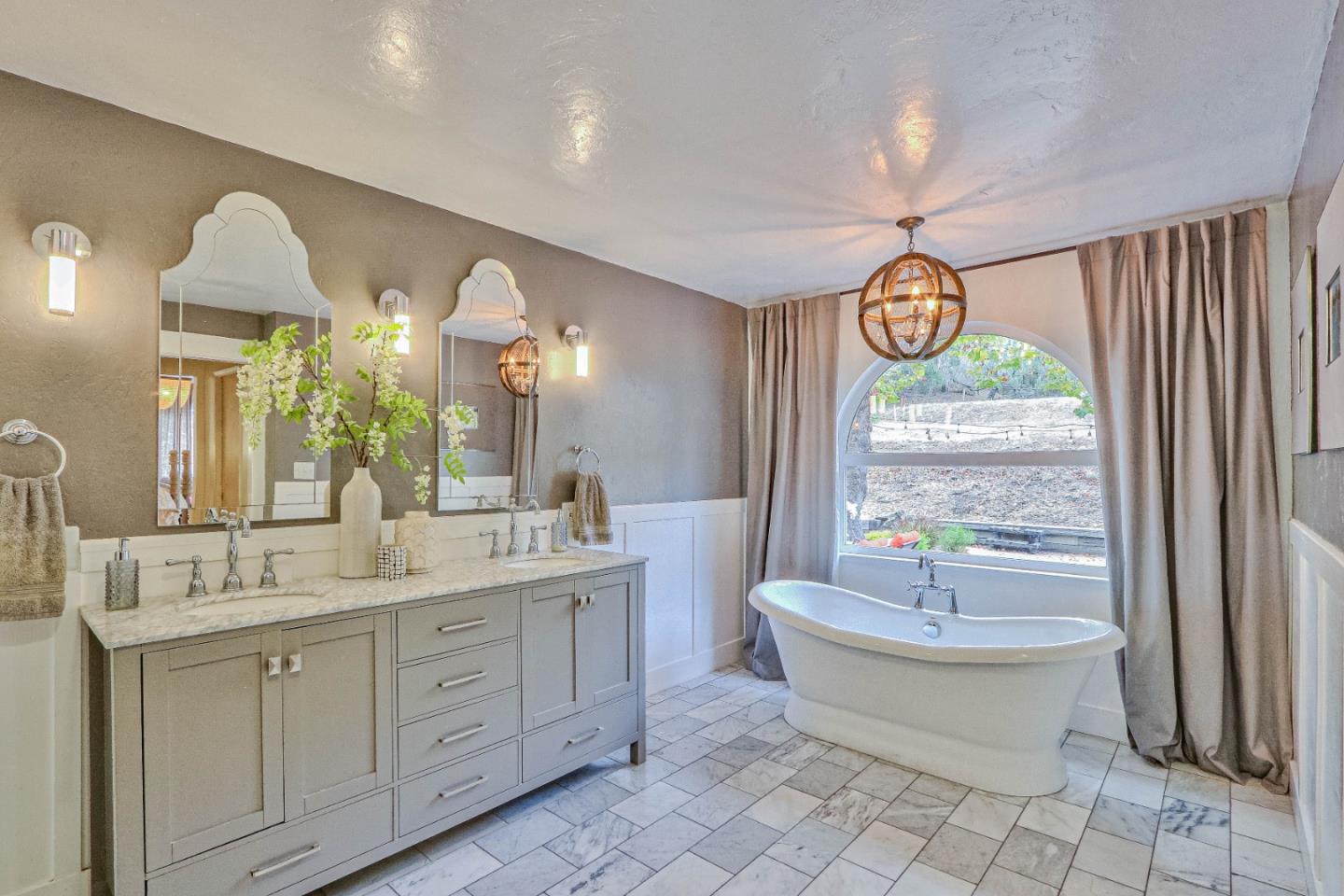 180 San Benancio Road Salinas, CA 93908 - Photo 16 of 27 a spacious bathroom with a double vanity sink mirror and a bathtub