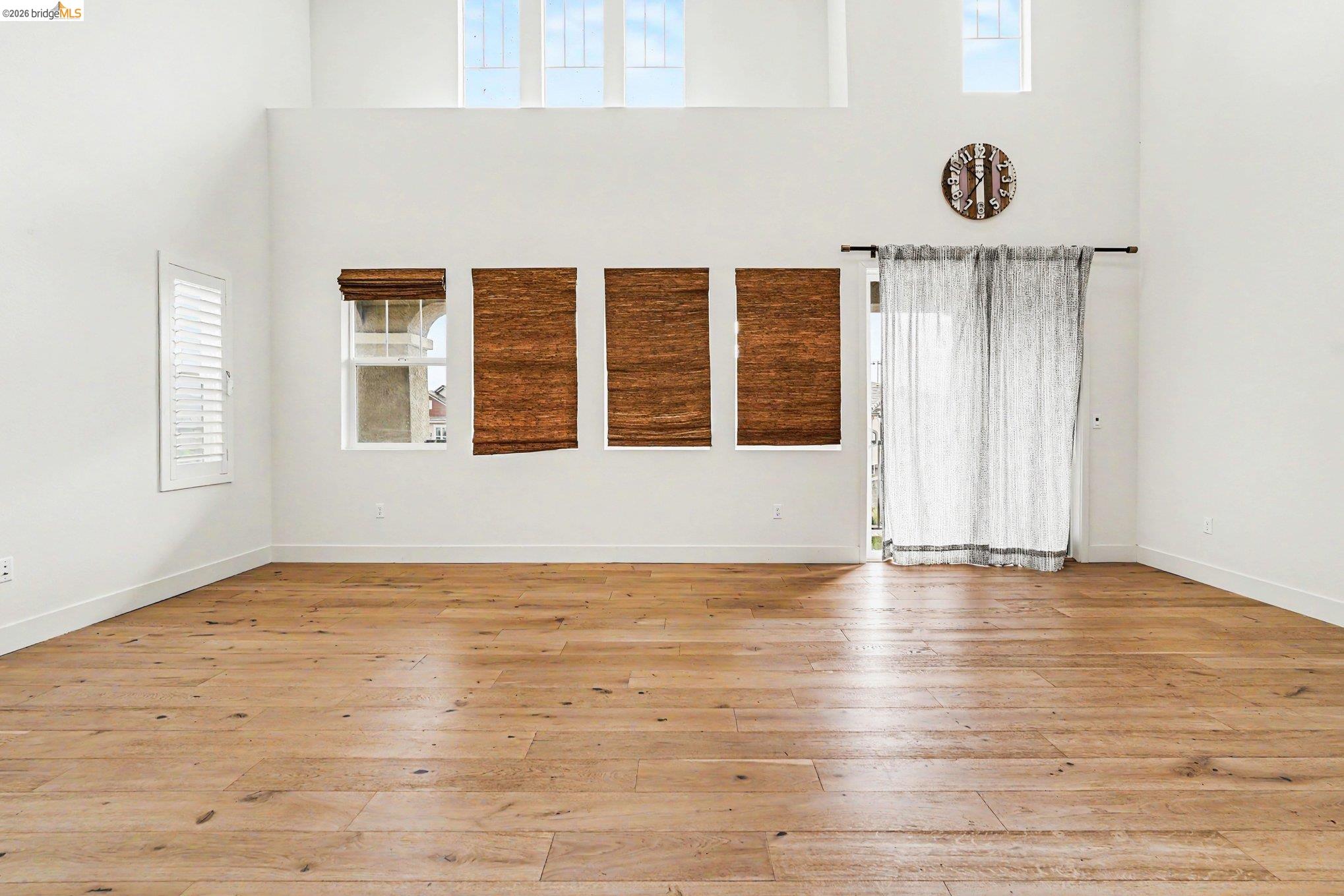 18210 Argento Loop San Ramon, CA 94583 - Photo 7 of 44 Expansive room featuring wood-finish flooring and high ceilings