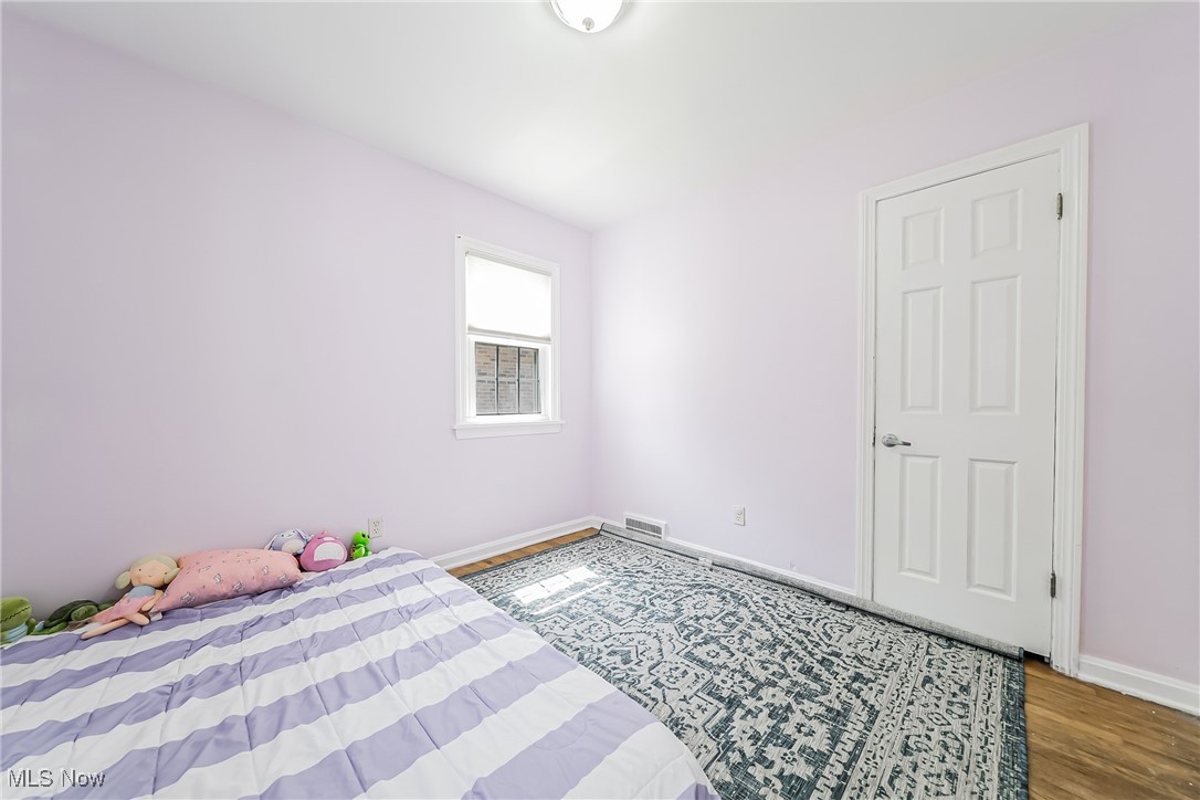 1607 Richmond Road Cleveland, OH 44124 - Photo 16 of 32 Bedroom featuring dark wood-type flooring