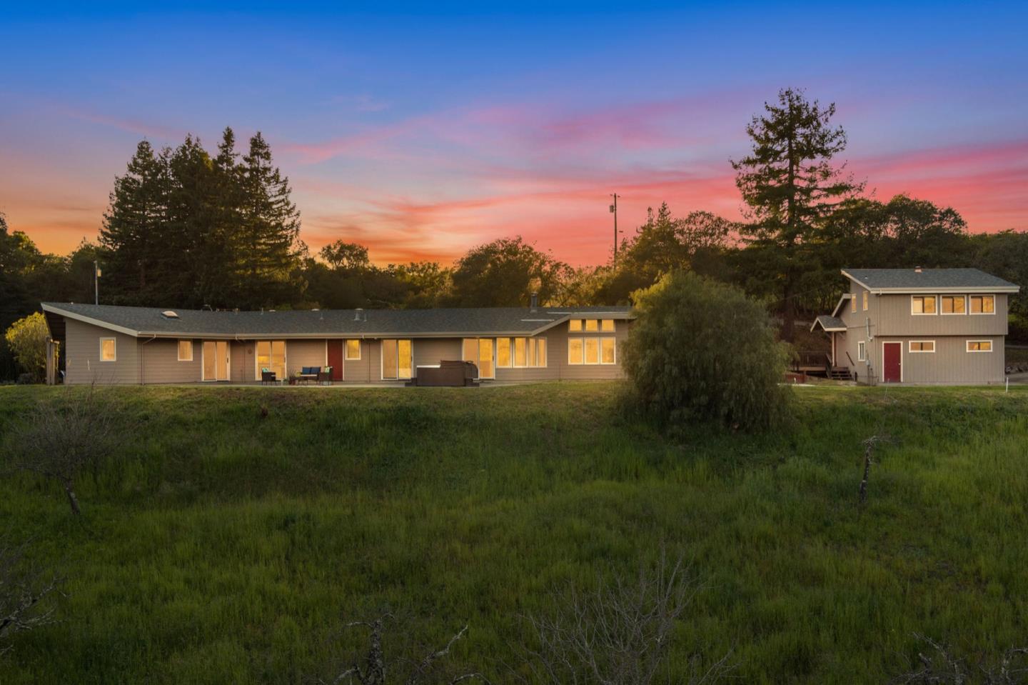 195 Raptor Road Watsonville, CA 95076 - Photo 1 of 63 a front view of a house with a garden