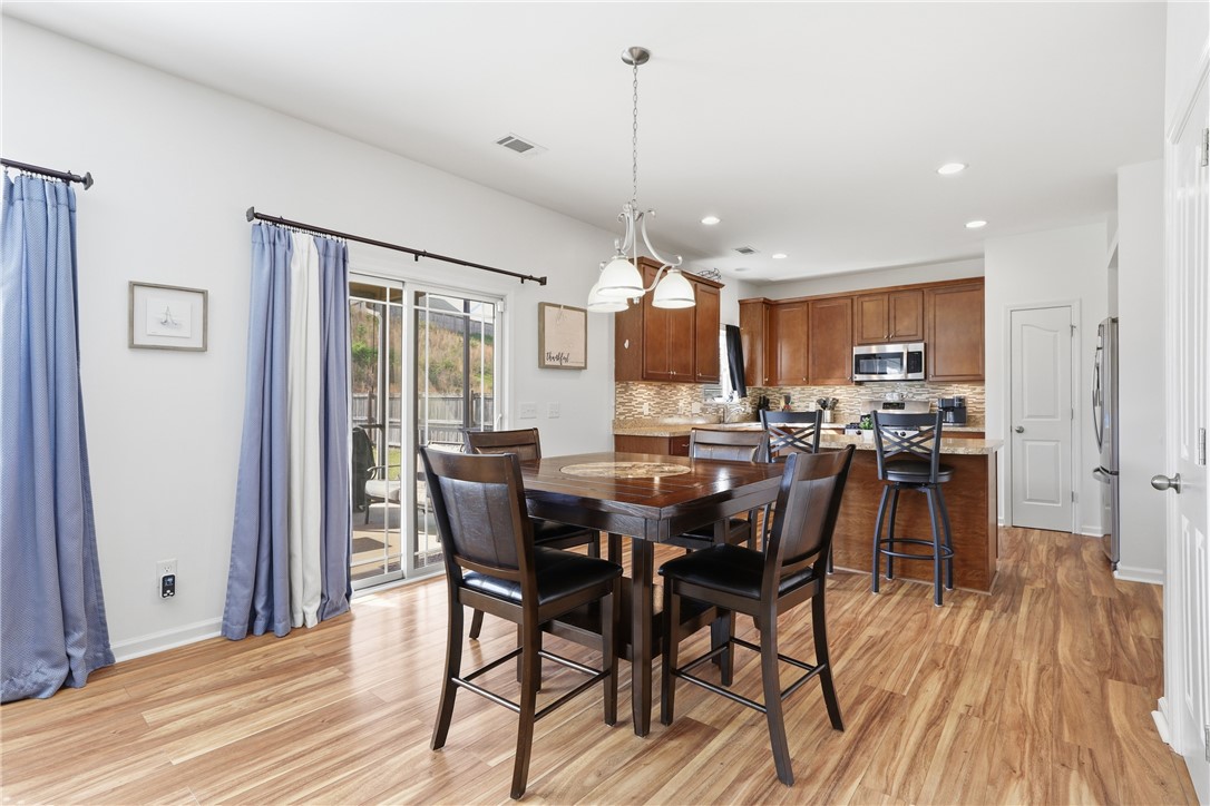 347 Riverdale Road Simpsonville, SC 29680 - Photo 6 of 30 This open concept space offers seamless transitions and abundant natural light.