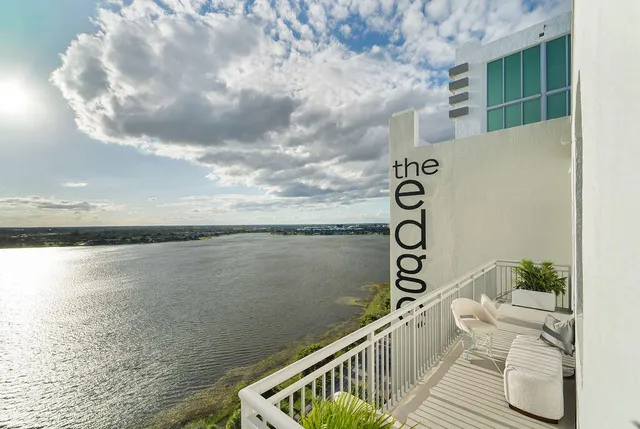 a view of balcony with furniture