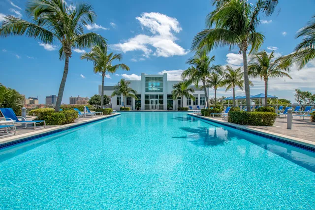 a view of swimming pool yard and lake view