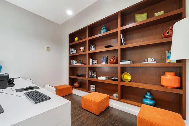 a workspace with furniture and lamp