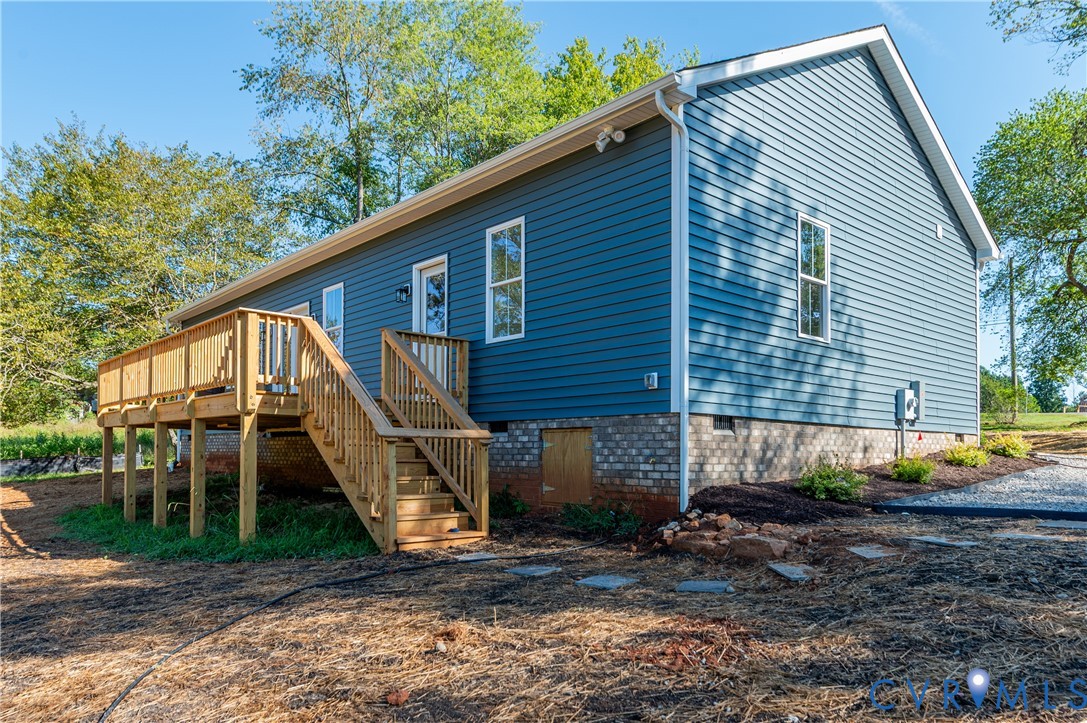 1393 Broad St Road Oilville, VA 23129 - Photo 37 of 39 Back of house with crawl space, stairs, and a deck