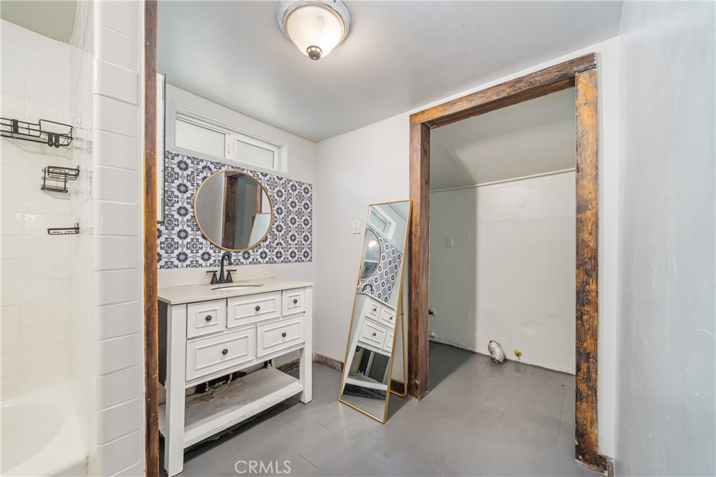 1501 Oriole Road Wrightwood, CA 92397 - Photo 18 of 29 a view of room with cabinet mirror and a ceiling fan