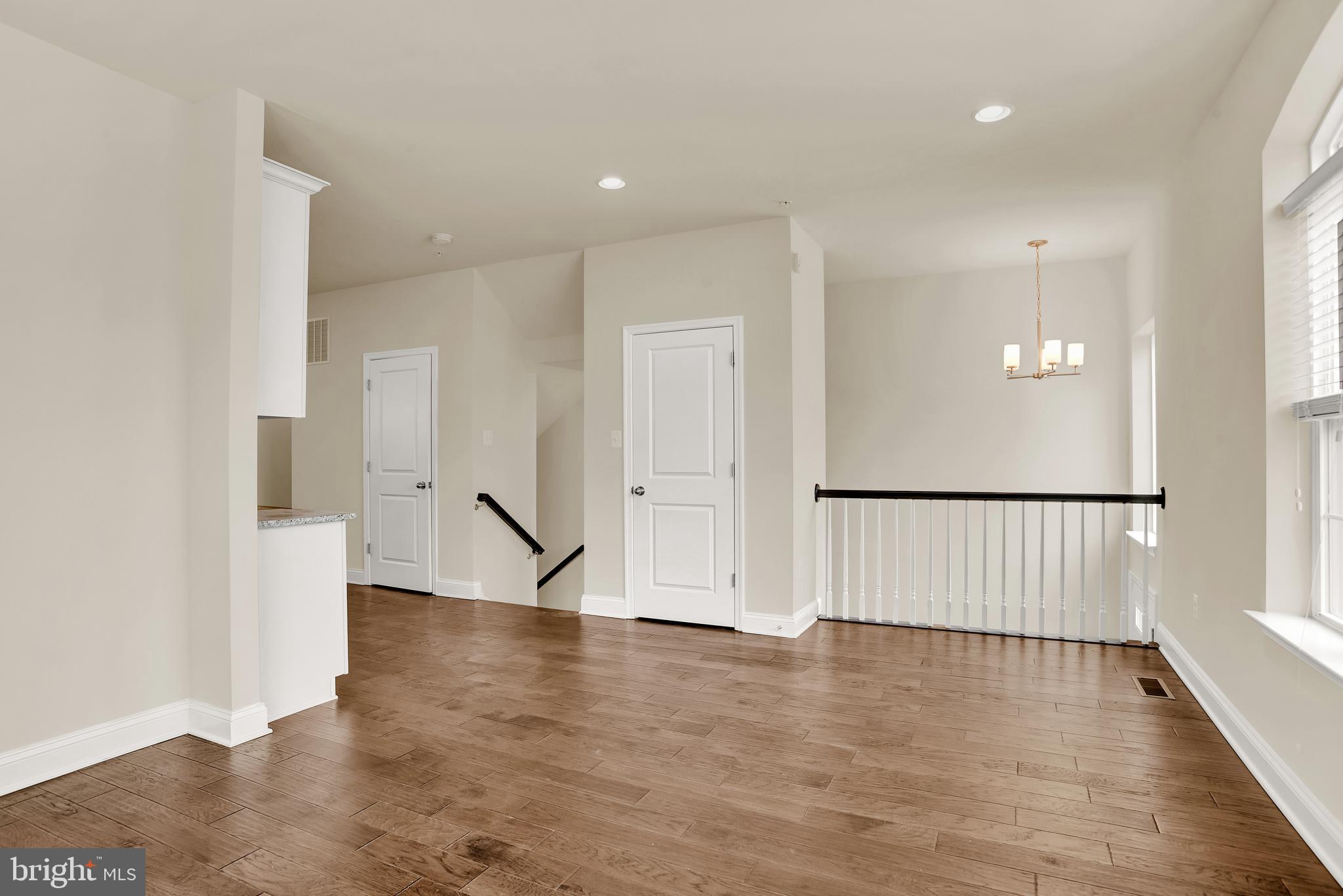 1227 Orchid Road Gambrills, MD 21054 - Photo 15 of 39 The dining room overlooks the 2 story foyer!