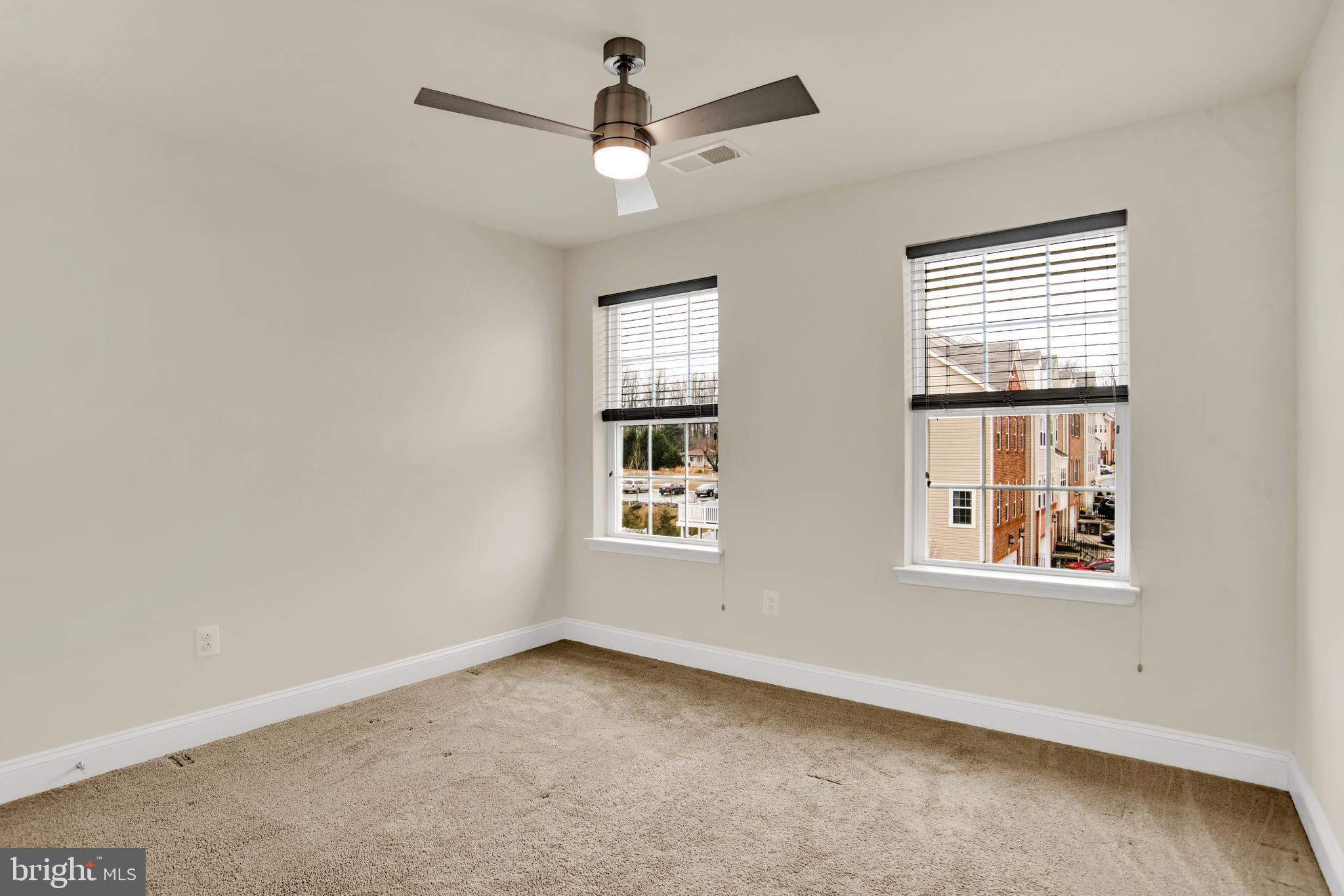1227 Orchid Road Gambrills, MD 21054 - Photo 22 of 39 Bedroom #2 with ceiling fan.