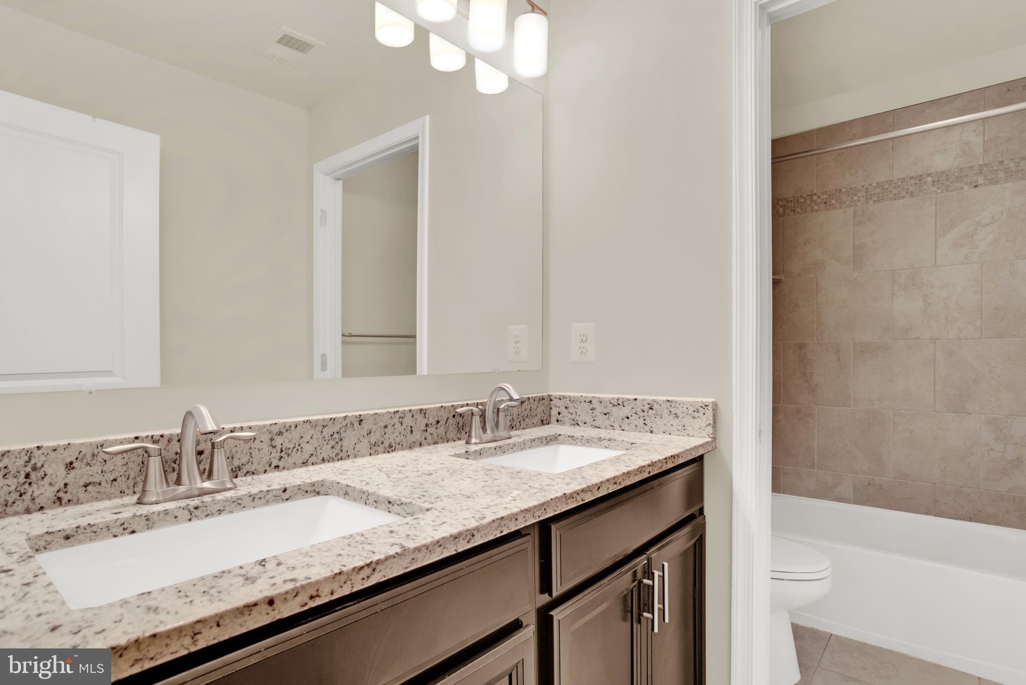 1227 Orchid Road Gambrills, MD 21054 - Photo 23 of 39 Hall bath, with dual bowl sink with granite top