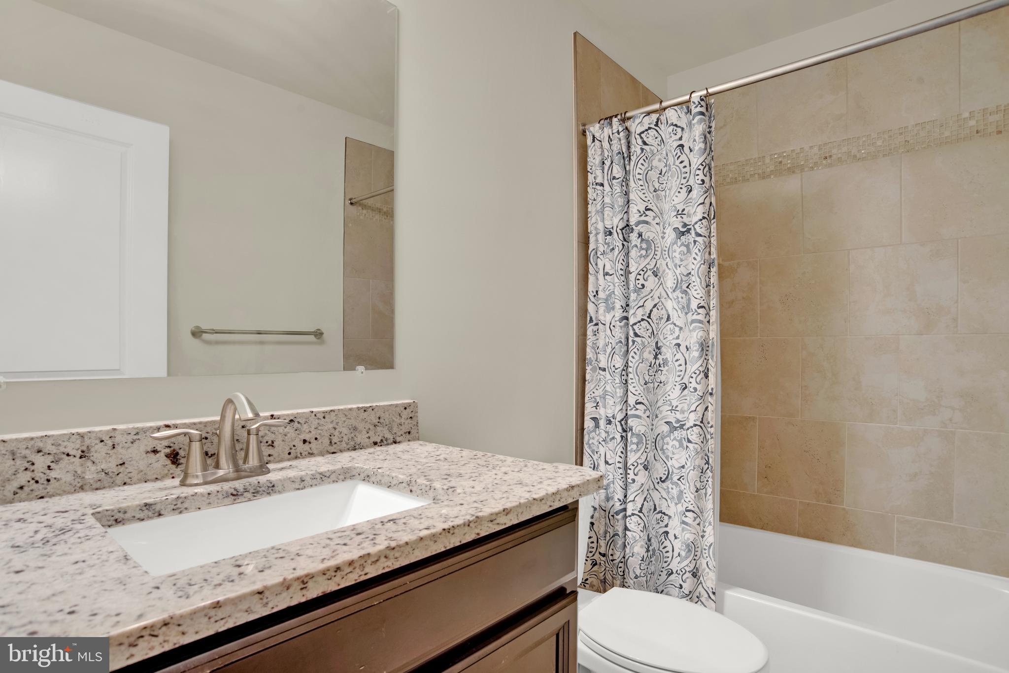 1227 Orchid Road Gambrills, MD 21054 - Photo 31 of 39 Main level full bath!