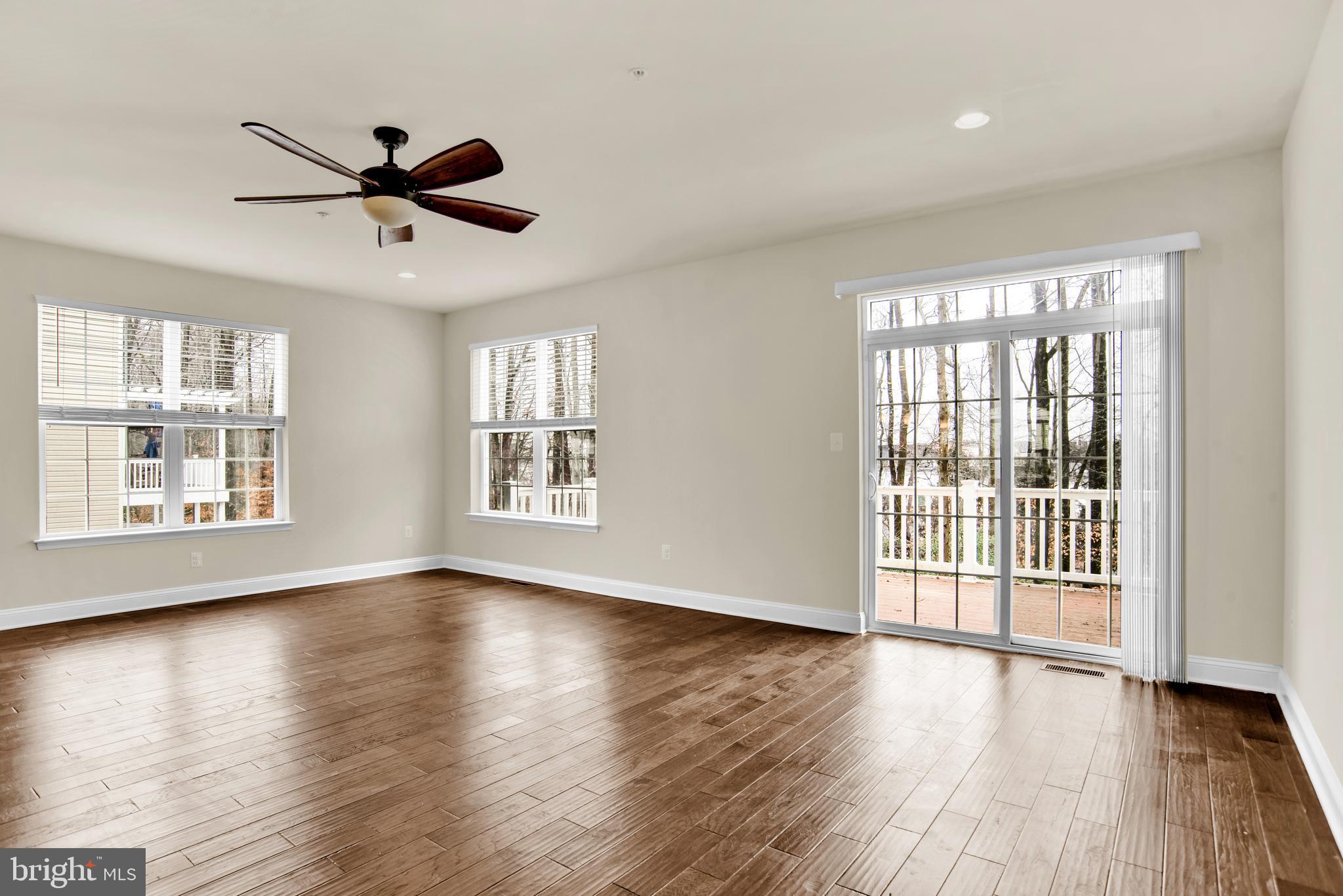 1227 Orchid Road Gambrills, MD 21054 - Photo 9 of 39 Generous living room, w/slider to the deck