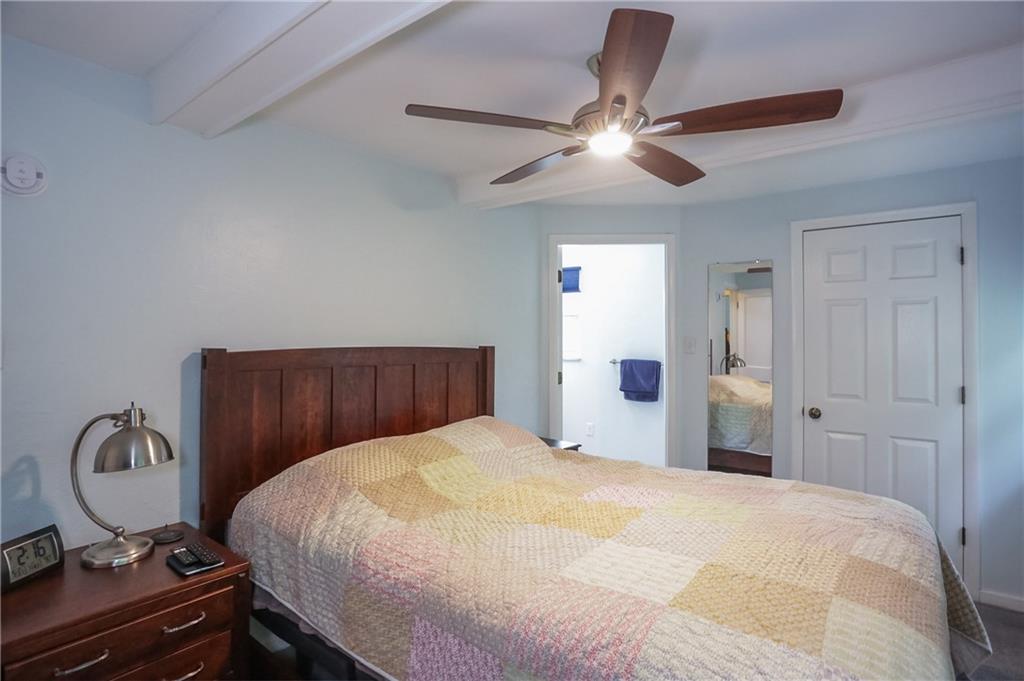 141 Ridge Avenue Pittsburgh, PA 15237 - Photo 20 of 39 The primary bedroom features exposed beams and a private bathroom.