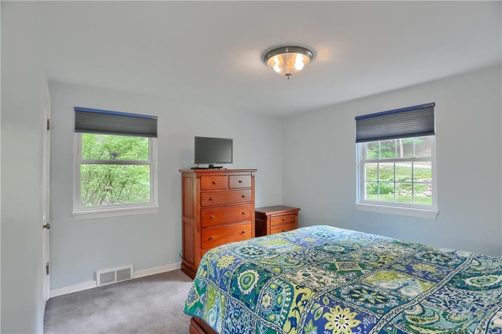 141 Ridge Avenue Pittsburgh, PA 15237 - Photo 24 of 39 Two windows flood this guest bedroom with ample natural light.