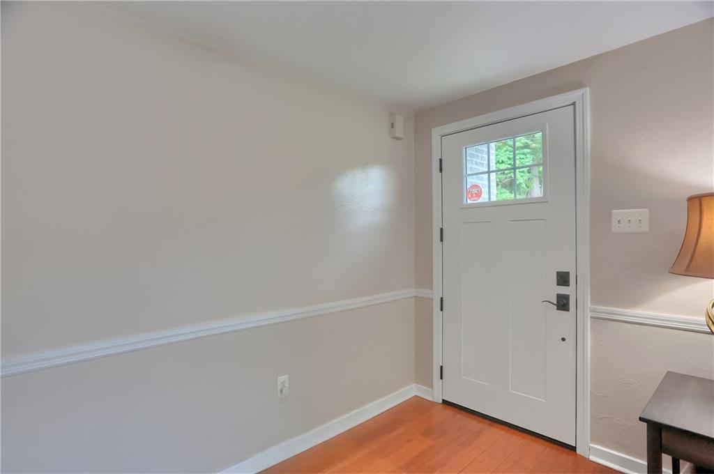 141 Ridge Avenue Pittsburgh, PA 15237 - Photo 7 of 39 Enter and take note of the hardwood flooring and neutral tone.
