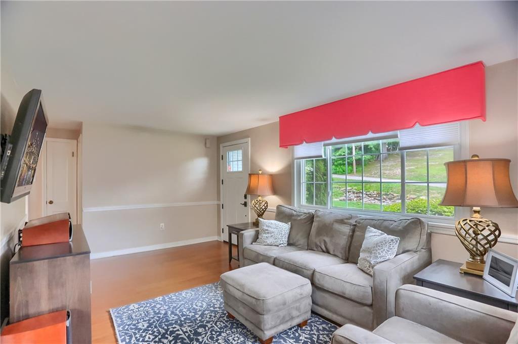 141 Ridge Avenue Pittsburgh, PA 15237 - Photo 10 of 39 A large picture window floods the family room with abundant natural light.