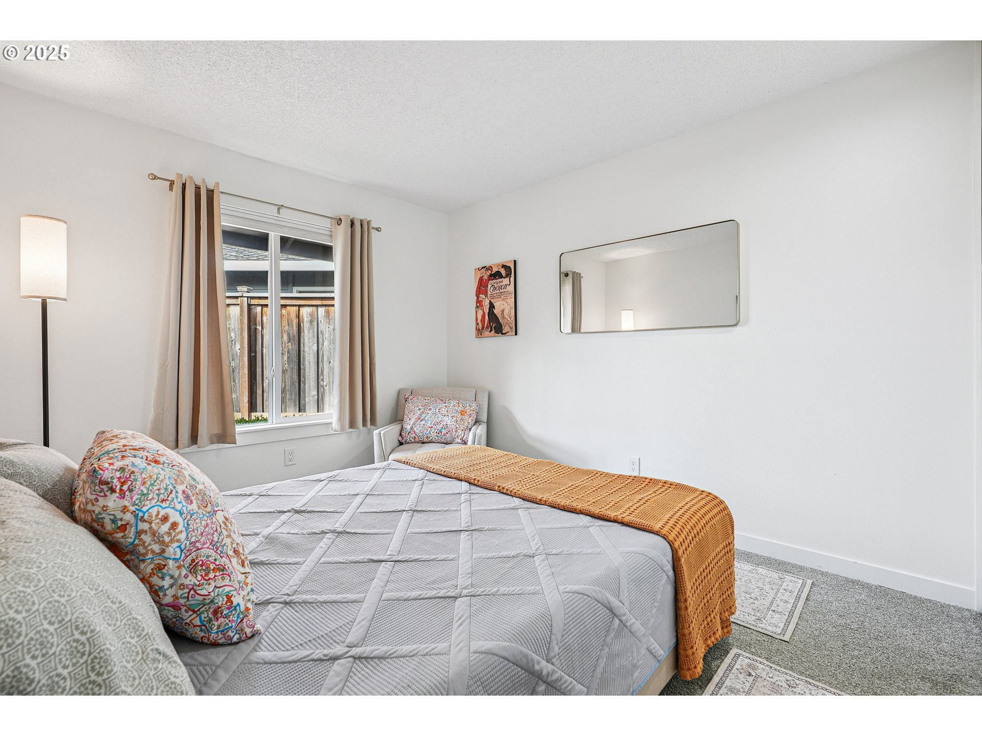 15920 Southwest Century Oak Circle Portland, OR 97224 - Photo 19 of 30 a bedroom with a bed and a painting