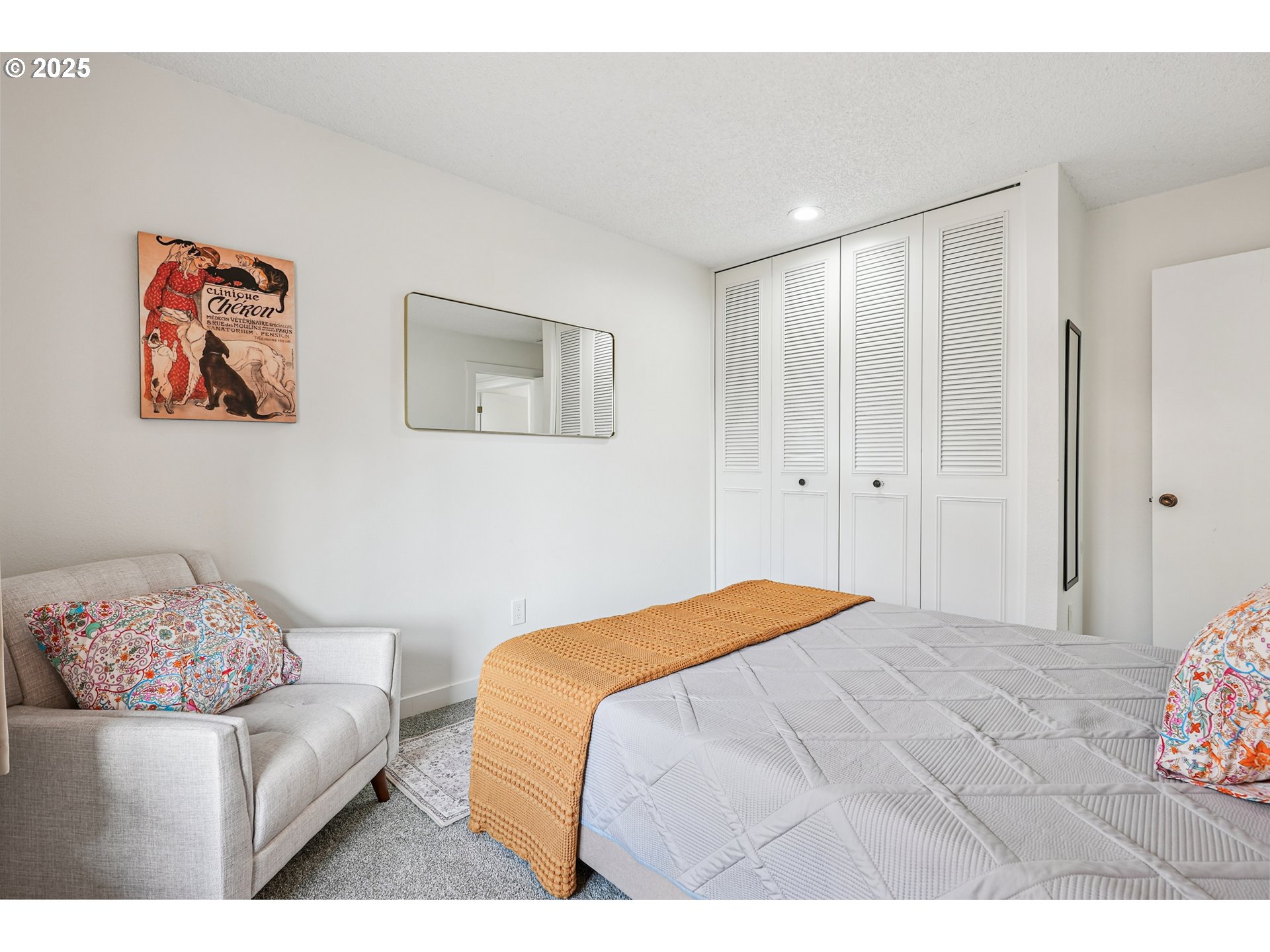 15920 Southwest Century Oak Circle Portland, OR 97224 - Photo 20 of 30 a bedroom with a bed and a painting on the wall