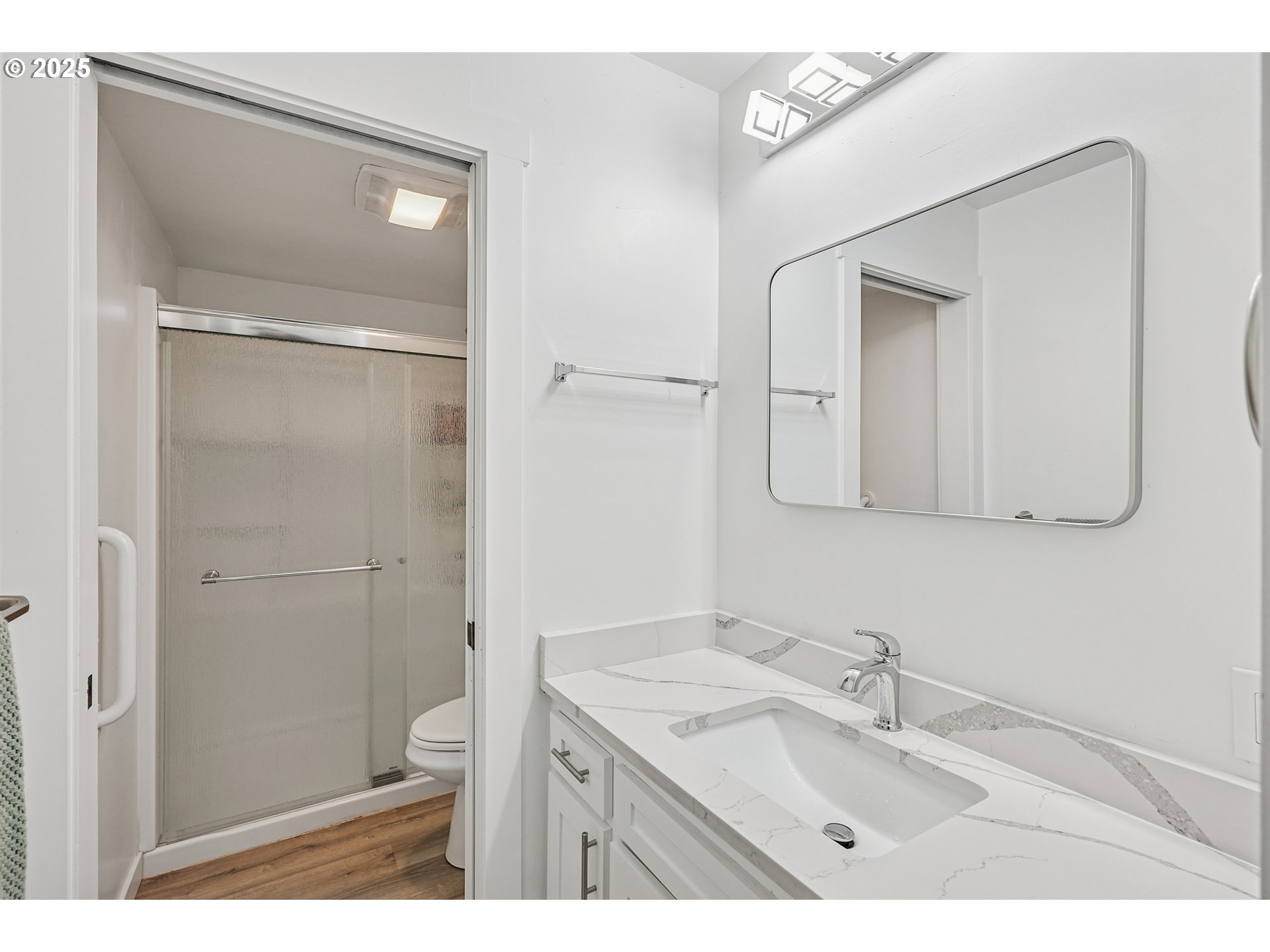 15920 Southwest Century Oak Circle Portland, OR 97224 - Photo 21 of 30 a bathroom with a granite countertop sink mirror and vanity
