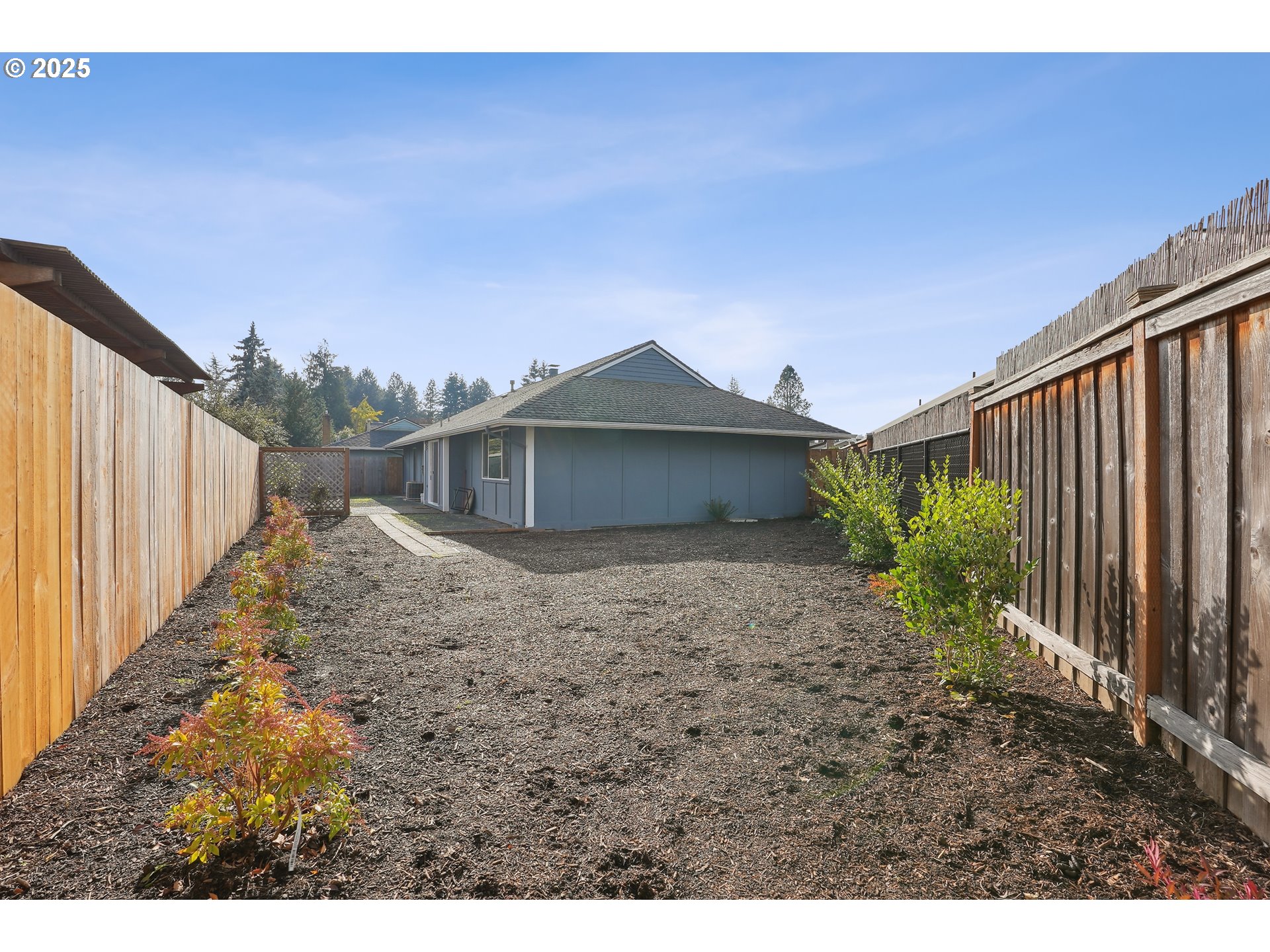 15920 Southwest Century Oak Circle Portland, OR 97224 - Photo 29 of 30 a view of a house with wooden fence