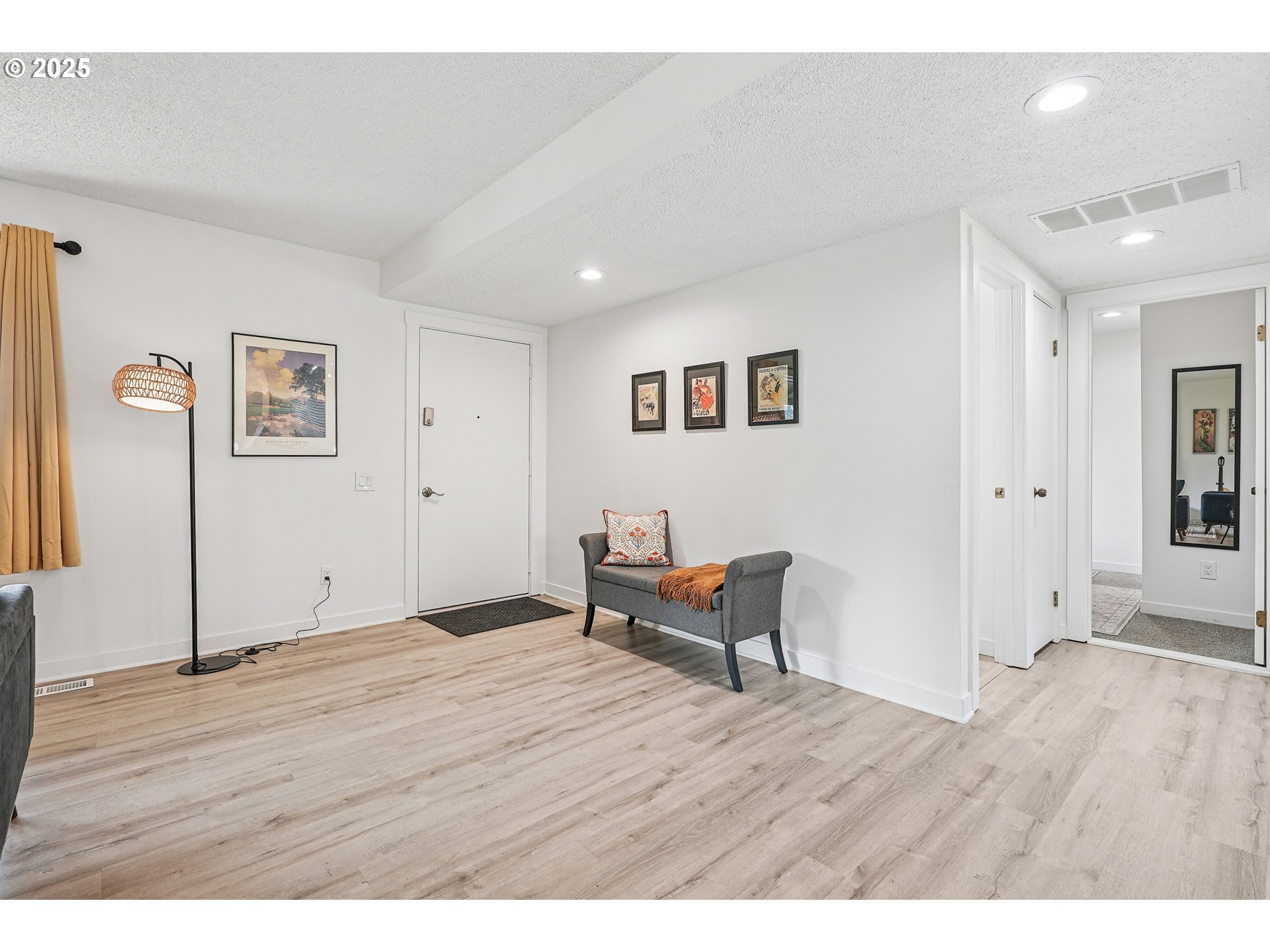 15920 Southwest Century Oak Circle Portland, OR 97224 - Photo 7 of 30 a view of a livingroom with wooden floor and furniture