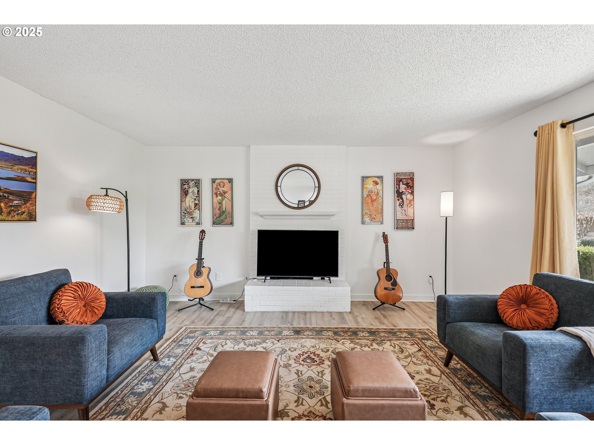 15920 Southwest Century Oak Circle Portland, OR 97224 - Photo 9 of 30 a living room with furniture and a fireplace