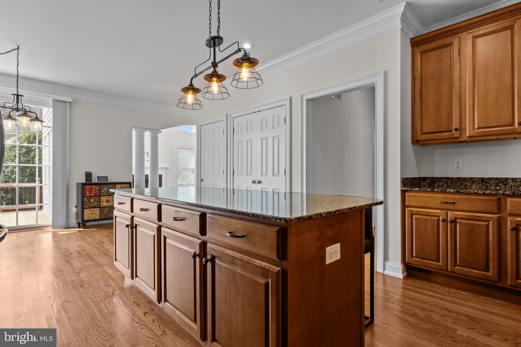 3541 Reading Way Huntingdon Valley, PA 19006 - Photo 15 of 54 a kitchen with stainless steel appliances granite countertop a stove a sink dishwasher and a refrigerator with wooden floor