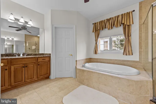 a view of an entryway wooden floor and stairs