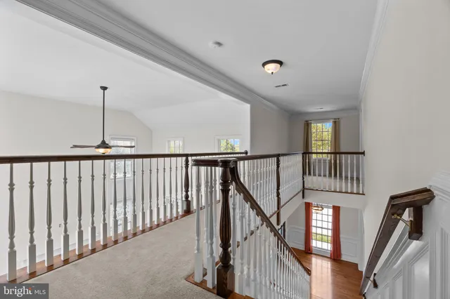 a bathroom with a sink a large mirror and a shower