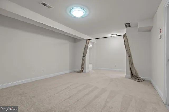 a view of a room with racks on the wall