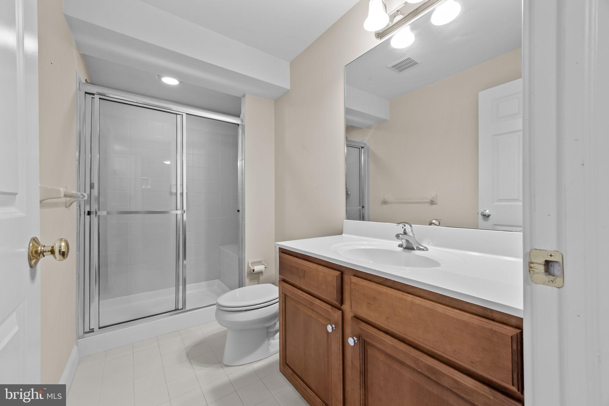 3541 Reading Way Huntingdon Valley, PA 19006 - Photo 48 of 54 a bathroom with a sink a toilet and shower