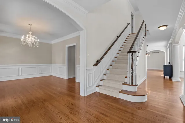 a view of entryway with wooden floor