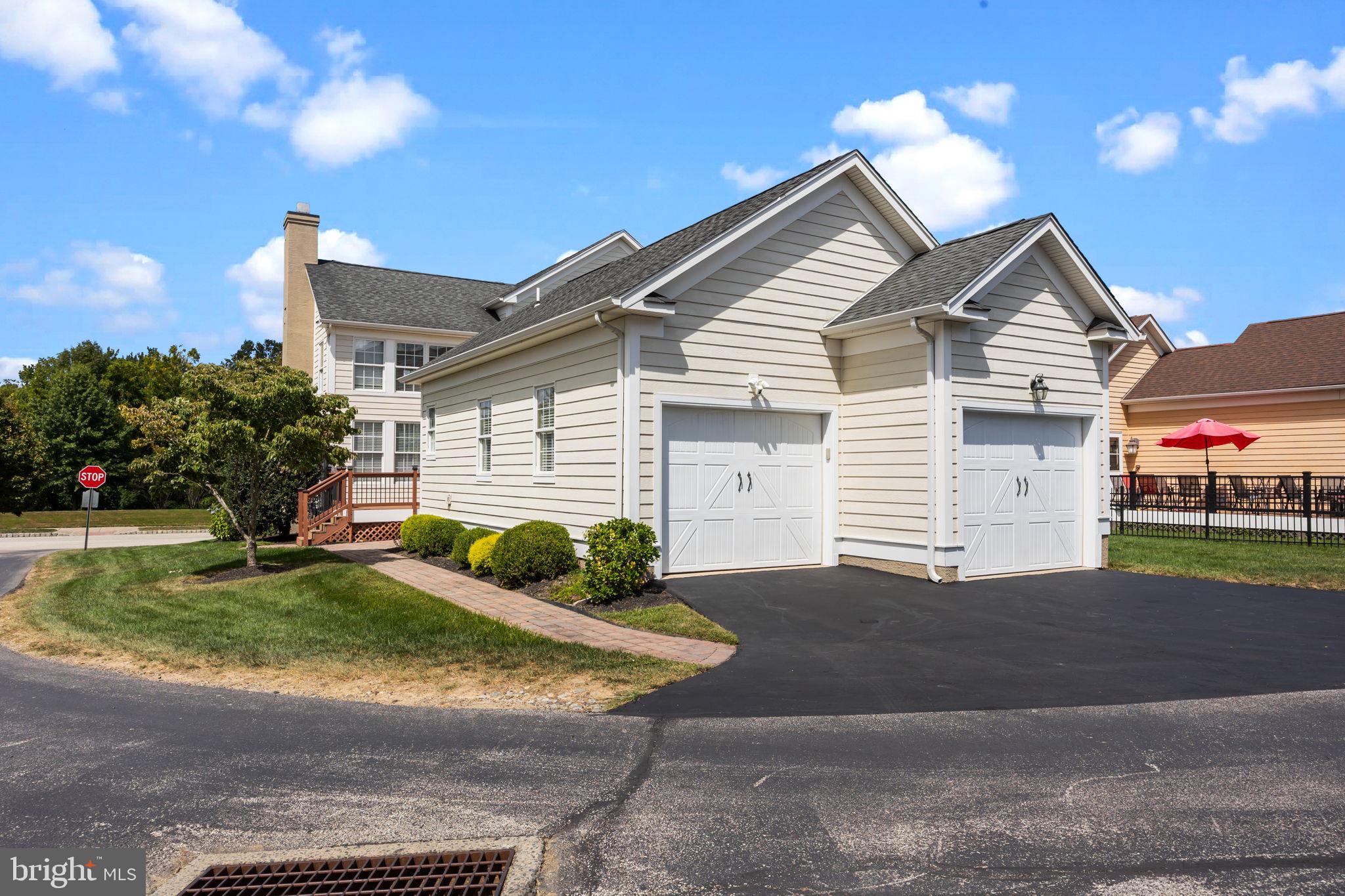3541 Reading Way Huntingdon Valley, PA 19006 - Photo 52 of 54 a front view of a house with garden