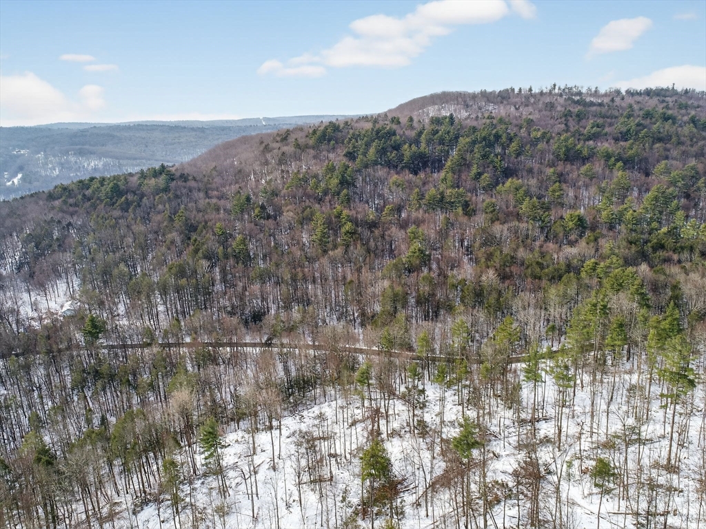 46 Bromley Road Huntington, MA 01050 - Photo 13 of 18 a view of a lake with mountains in the background