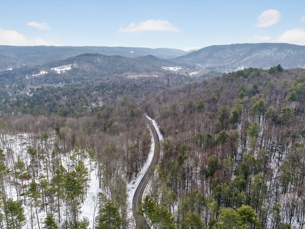 46 Bromley Road Huntington, MA 01050 - Photo 15 of 18 a view of a mountain range with trees in the background