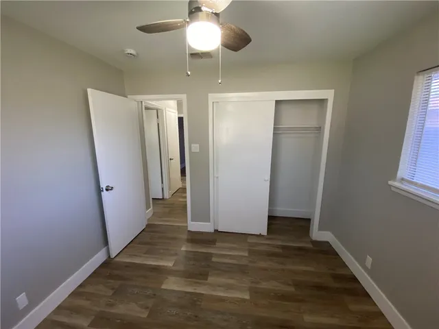 a view of entryway with wooden floor
