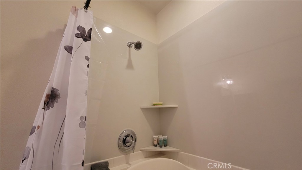 12349 Rodeo Drive, Unit B Rancho Cucamonga, CA 91739 - Photo 16 of 22 The tub/shower areas has two shower heads.