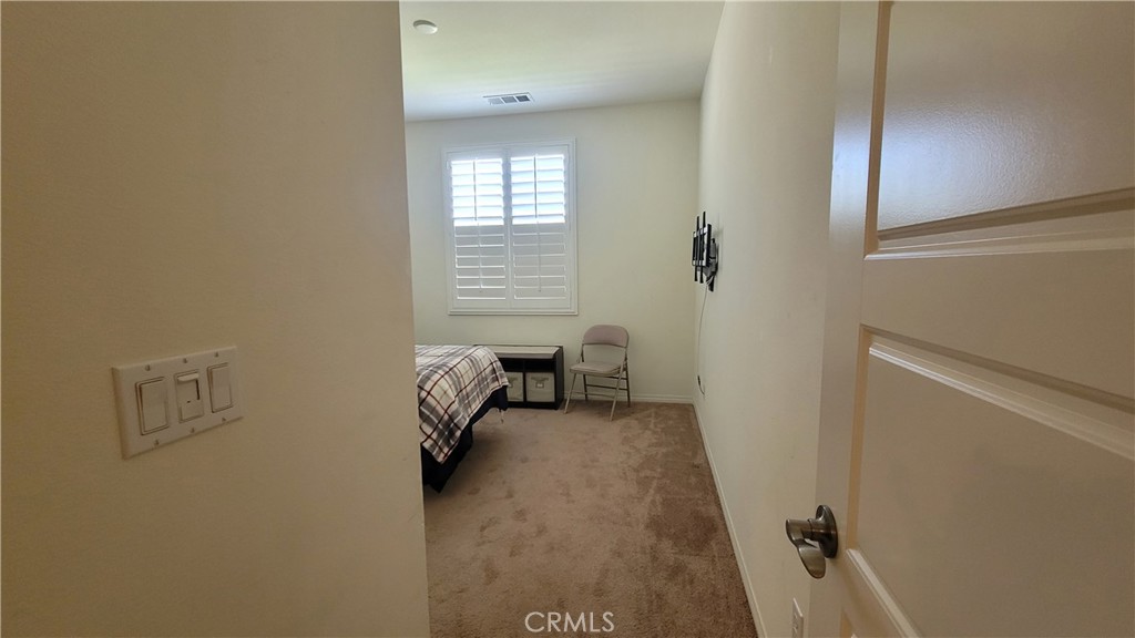 12349 Rodeo Drive, Unit B Rancho Cucamonga, CA 91739 - Photo 17 of 22 Entry to the bedroom.