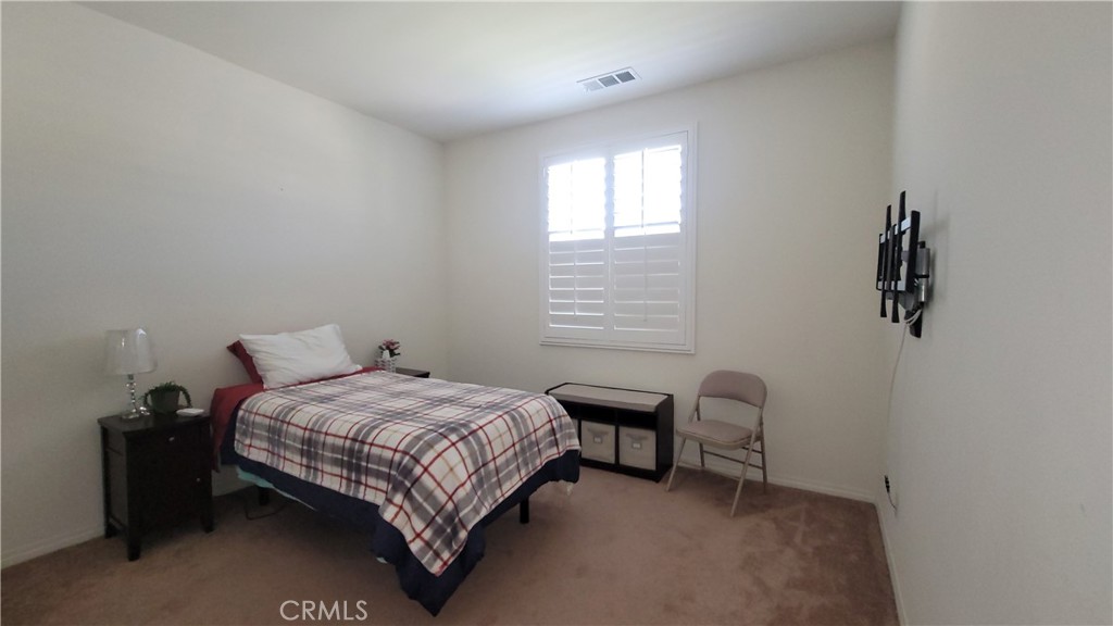 12349 Rodeo Drive, Unit B Rancho Cucamonga, CA 91739 - Photo 18 of 22 This spacious bedroom will fit just about any sized bed. If you need a bed, the housing provider would be happy to allow you to use this one.