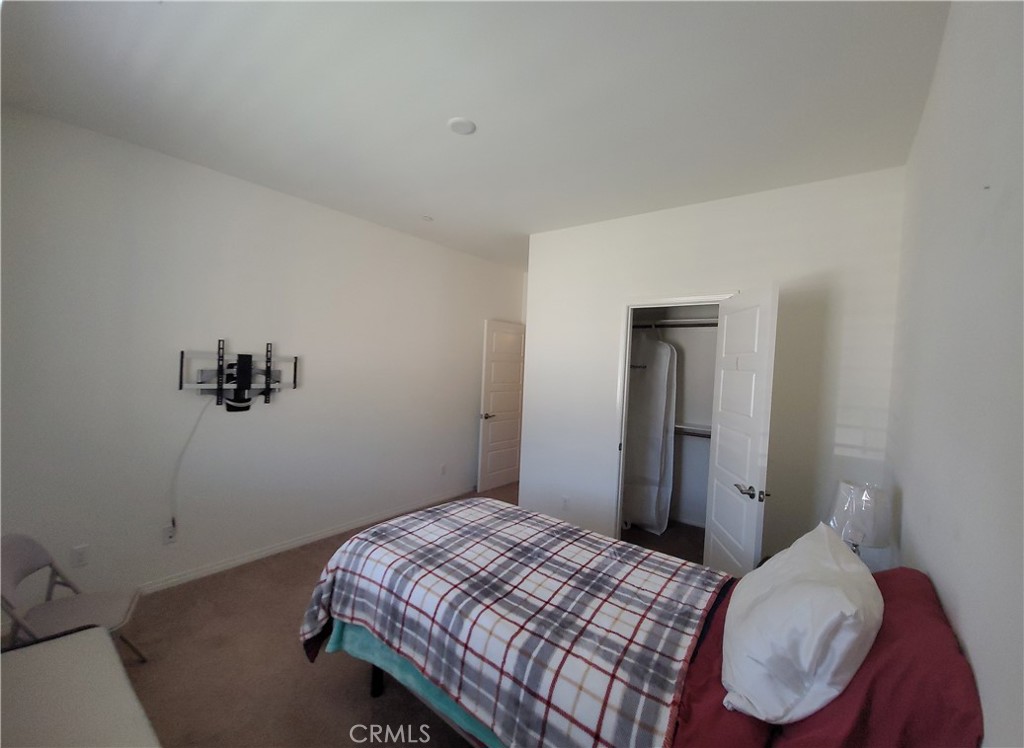 12349 Rodeo Drive, Unit B Rancho Cucamonga, CA 91739 - Photo 20 of 22 There is a TV mount if you want to put a TV in your bedroom.