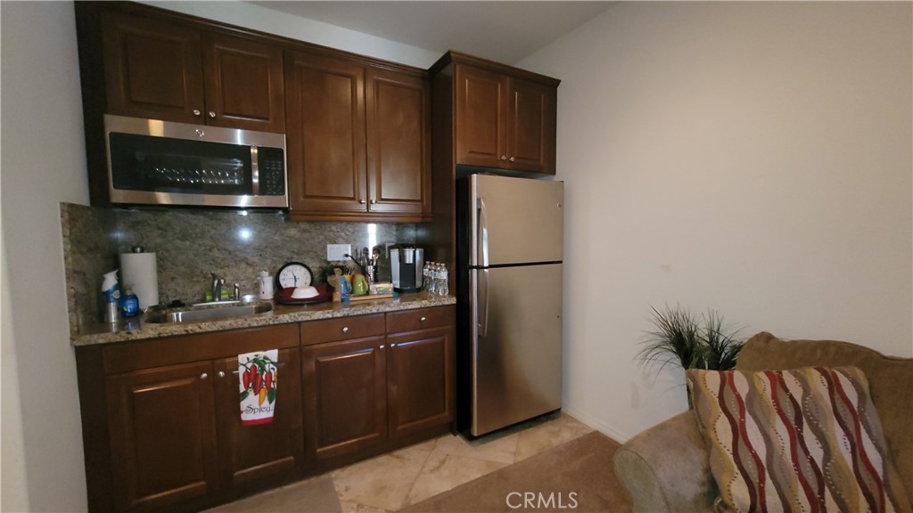 12349 Rodeo Drive, Unit B Rancho Cucamonga, CA 91739 - Photo 10 of 22 This kitchen will save your money from having to eat out. You can prepare light meals with ease.