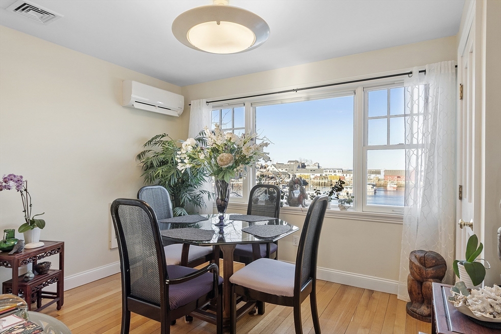 1 Dock Square Rockport, MA 01966 - Photo 17 of 34 a dining room with furniture and window