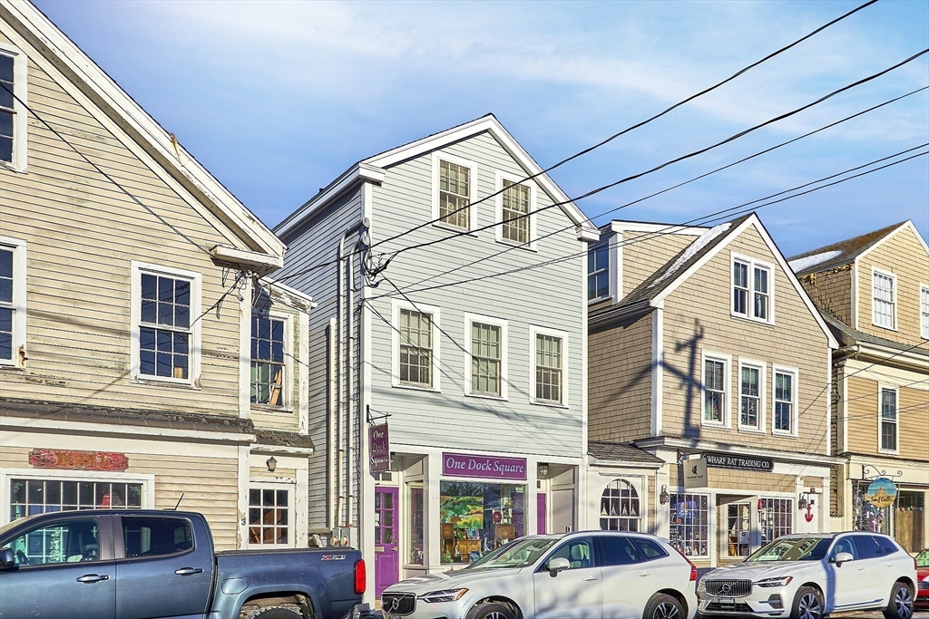 1 Dock Square Rockport, MA 01966 - Photo 2 of 34 a view of a brick building with large windows